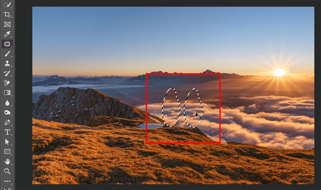 drag the selected area using content-aware patch tool