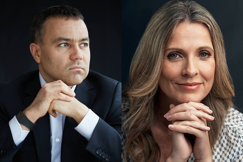 headshot poses hands near the face